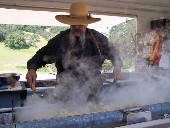 Billy cooking on the grill inside big red