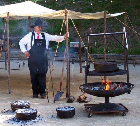 Billy cooking with a Dutch Oven