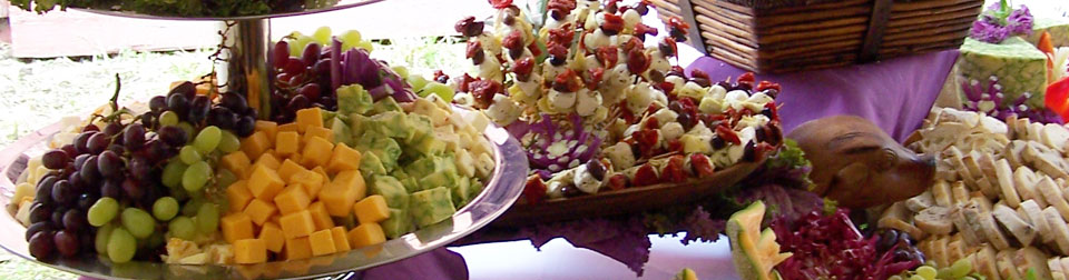 display of fruits and cheeses